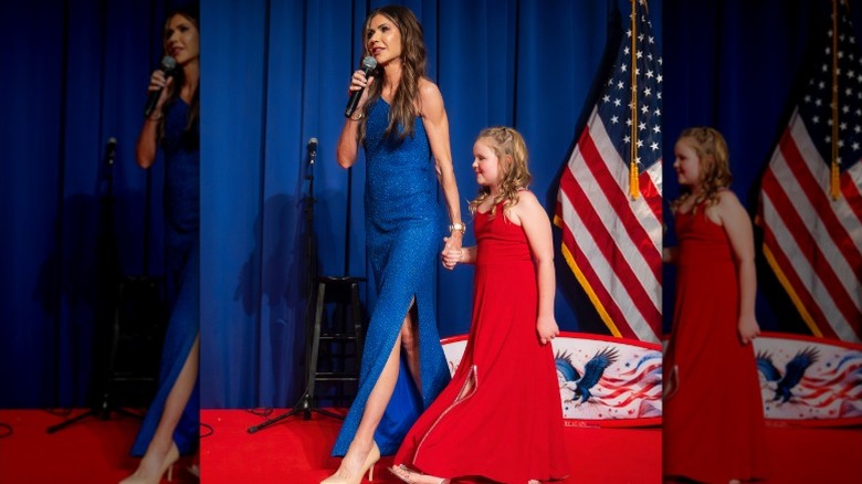 Kristi Noem on the stage at an event in Florida