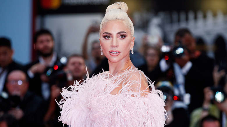 Lady Gaga wearing a pink ruffled outfit in Italy