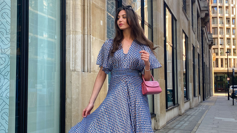 Woman wearing blue flowy dress