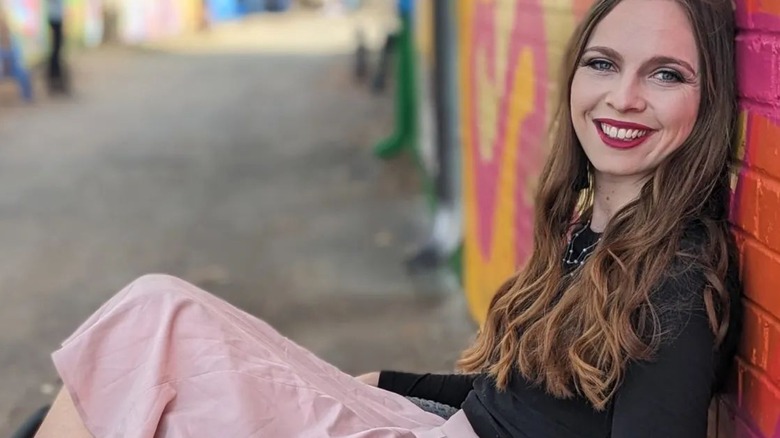 Woman in wheelchair wearing makeup