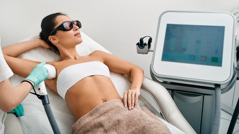 woman getting laser hair removal