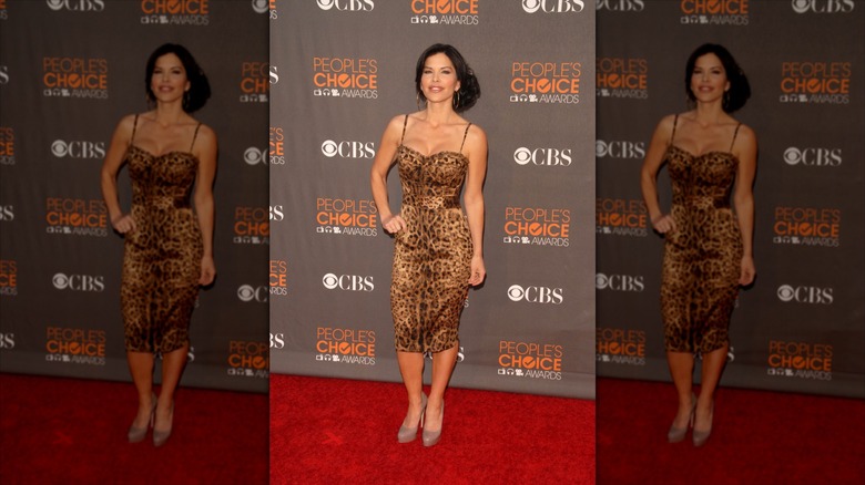 Lauren Sánchez Bezos smiles in a leopard print dress.