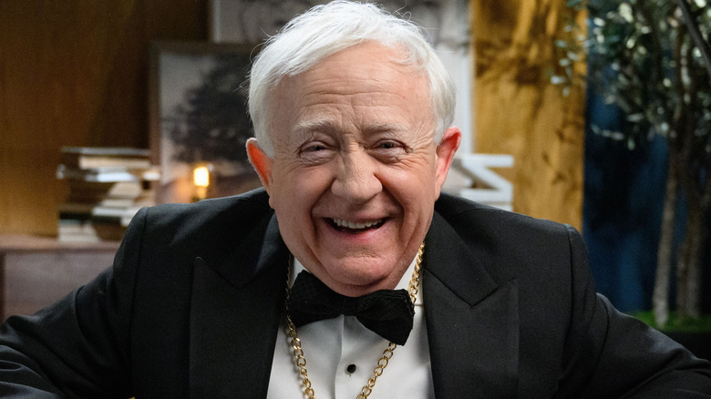 Leslie Jordan sitting and smiling