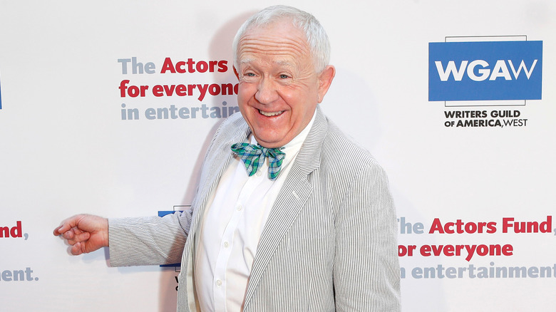 Leslie Jordan standing and smiling