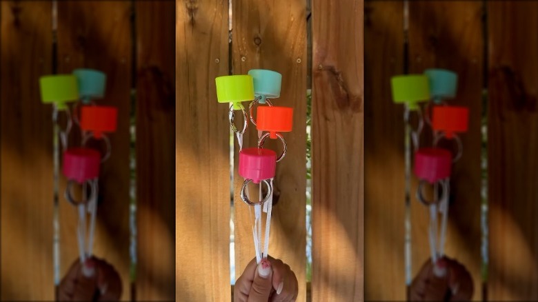 Lion Latch products dangling from ribbons