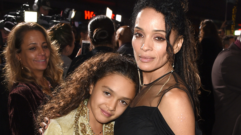 Lisa Bonet in a black dress posing with daughter Lola Momoa in 2018.