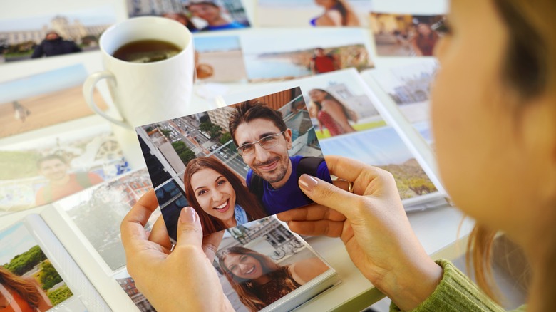 woman holding photo 