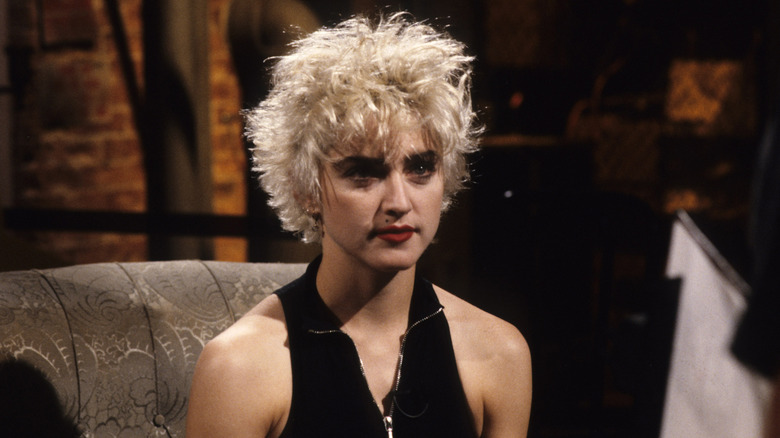 Madonna with short bleached bob and black tank top