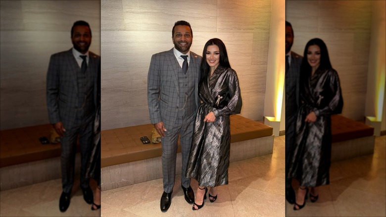 Kash Patel and Alexis Wilkins smiling