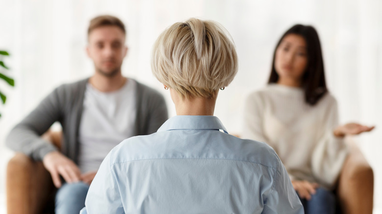 man and woman in therapy