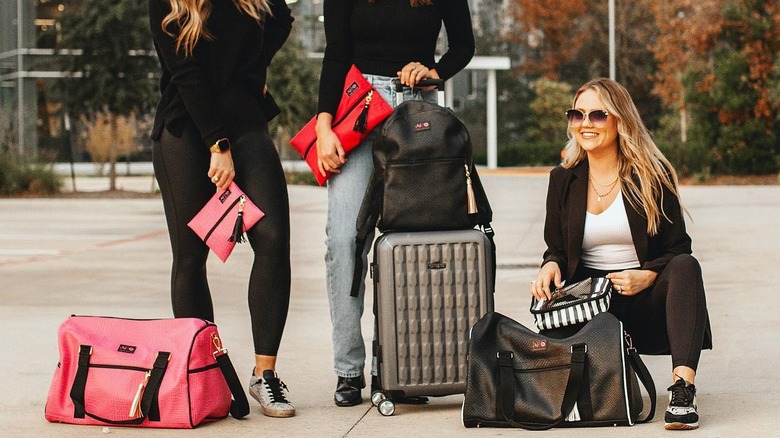 Women with their luggage