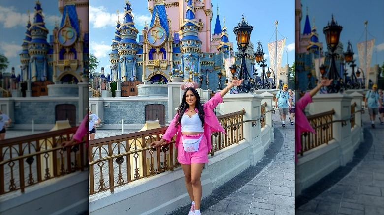 Girl wearing pink with white fanny pack.