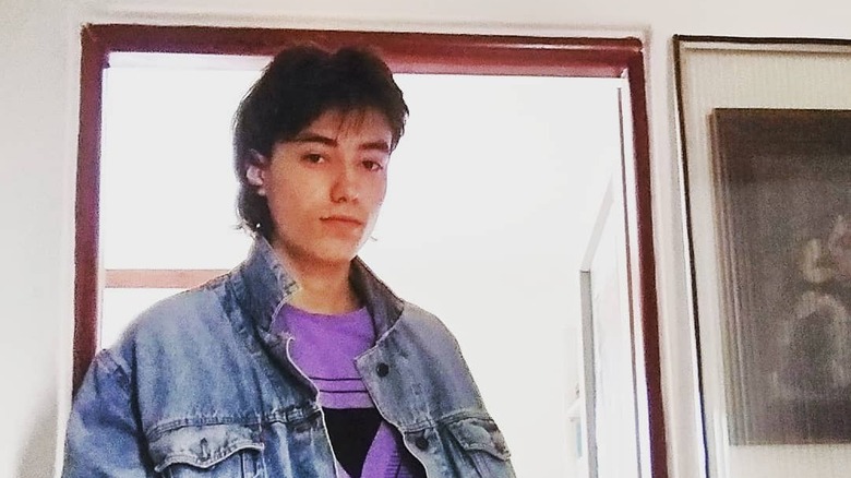 Person with '80s mall bangs