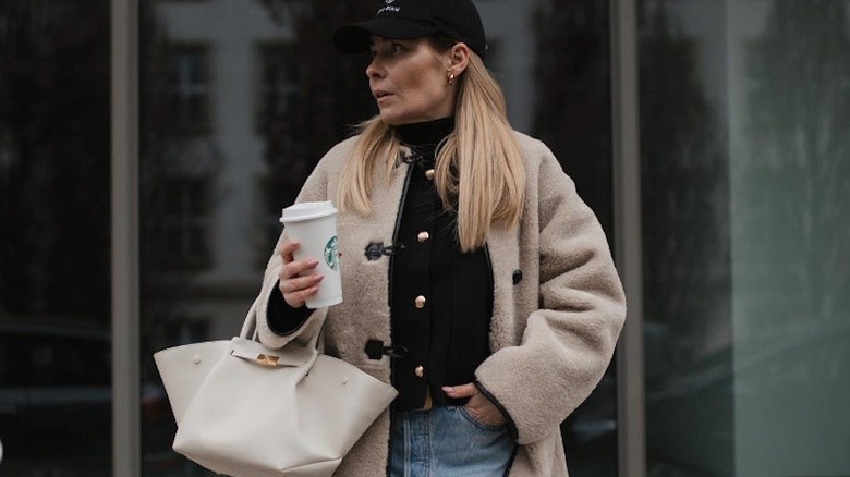 woman wearing Mango shearling coat