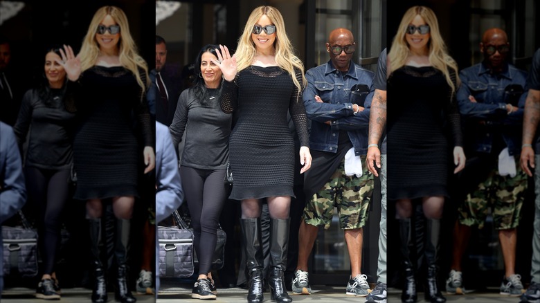Mariah Carey wearing a knit black dress