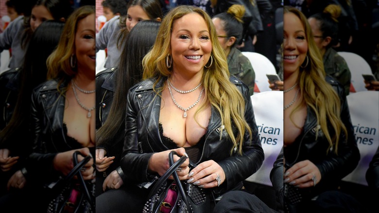 Mariah Carey wearing a black leather jacket