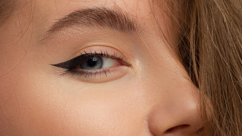 woman cat wing eye liner