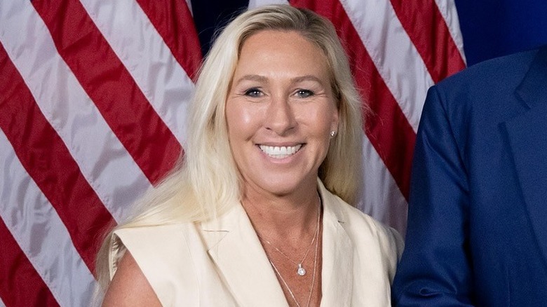 Marjorie Taylor Greene in a white dress