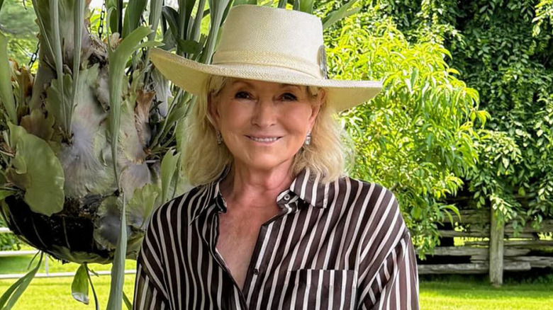 Martha Stewart wearing a straw hat