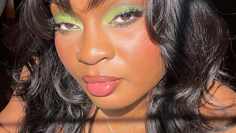 Bright green eyeshadow pink lipstick