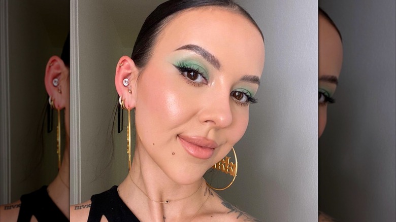 Green eyeshadow winged eyeliner