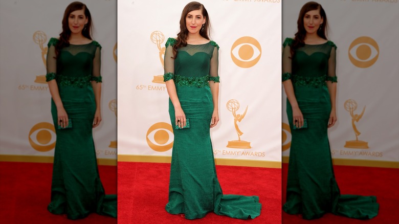 Mayim Bialik in a green dress at the Emmys