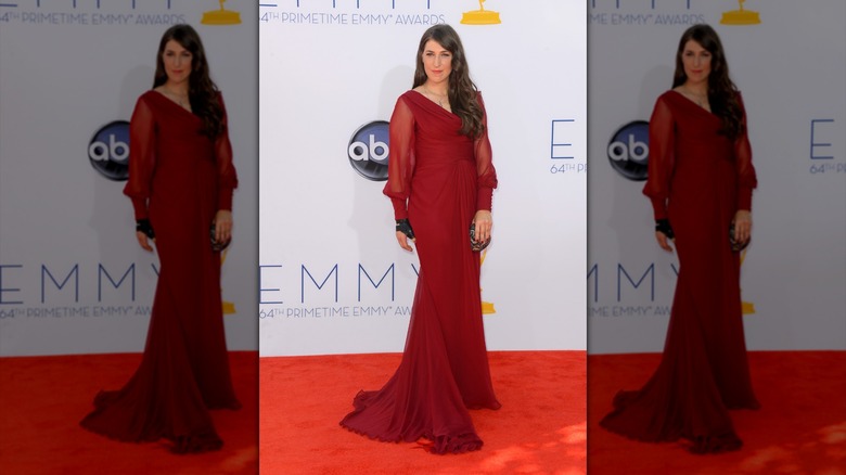 Mayim Bialik in a red sheer dress at the Emmys