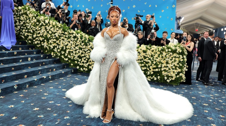 Megan Thee Stallion wearing a silver and white outfit at the 2025 Met Gala