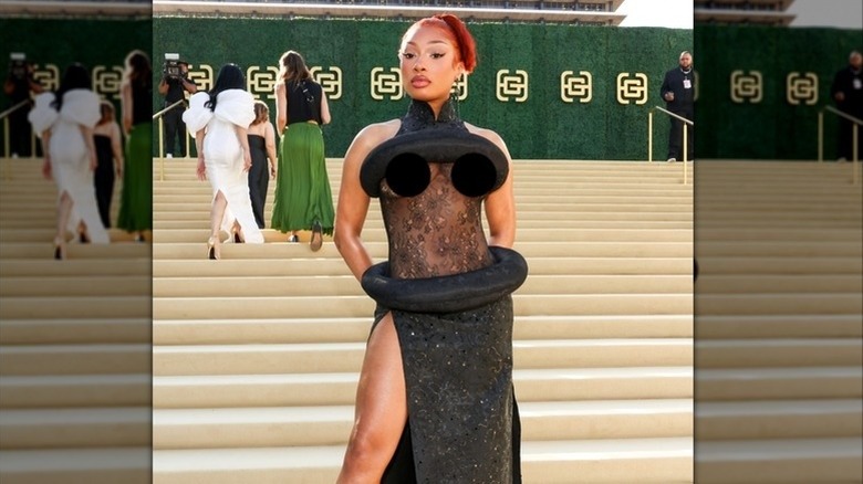 Megan Thee Stallion wearing a unique black dress at the Gold House Gala