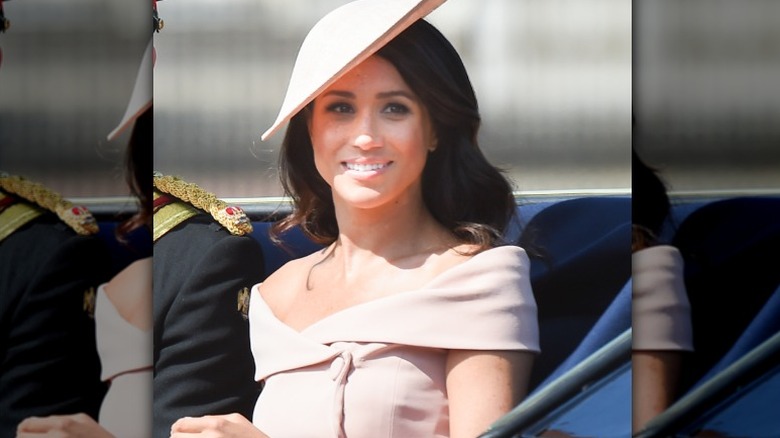 Meghan, the Duchess of Sussex, smiles at crowds at the 2018 Trooping the Color
