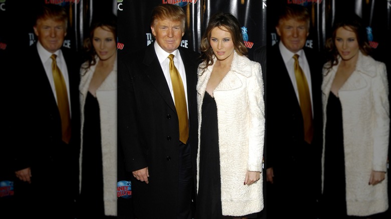 Donald Trump and Melania Trump stand on a red carpet