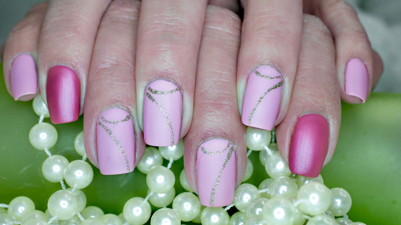 Hot, pale pink nails, pearls