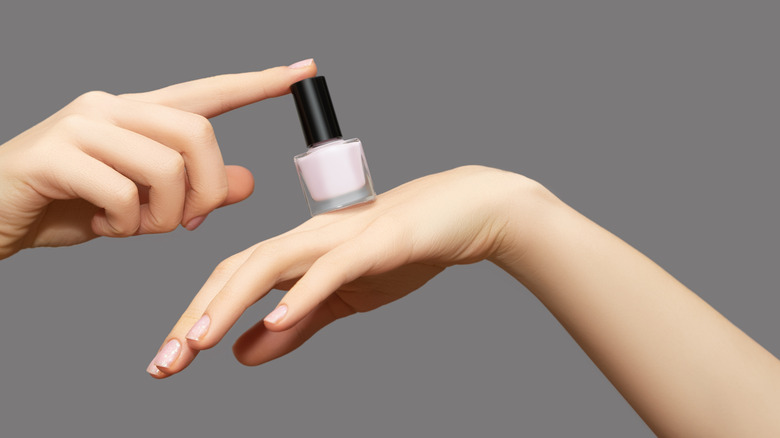 Pink pearlescent polish, matching manicure