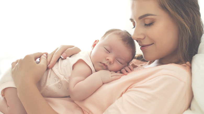 Mother holding newborn