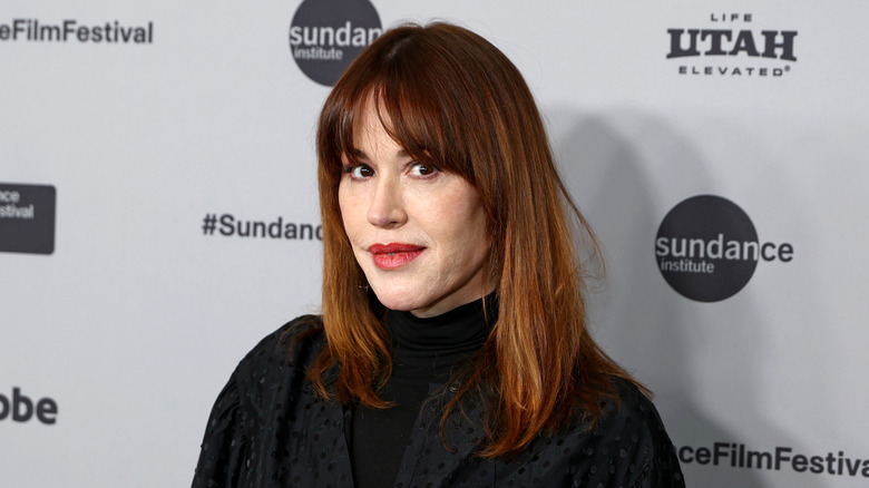 Molly Ringwald with bangs on the red carpet.