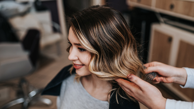 A woman with blond highlights