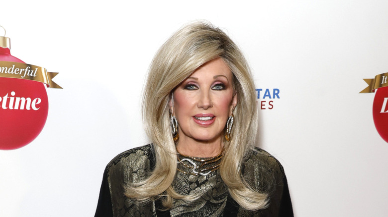 Morgan Fairchild wearing a black shirt