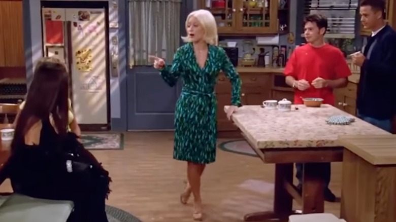 Staci Keanan wearing a wrap dress in an episode of "Step By Step."