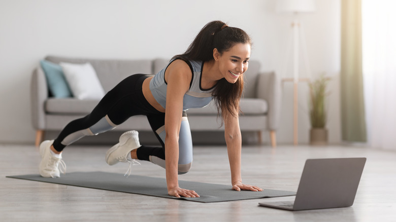 woman working out at home