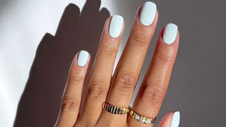 white nails and rings