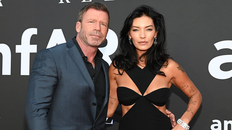 Taylor and Nicole Sheridan at a 2025 gala wearing formal outfits.
