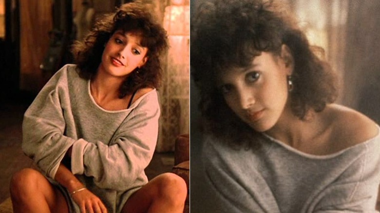 A scene from "Flashdance" featuring Jennifer Beals in a gray off-the-shoulder sweatshirt
