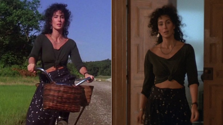 A scene from "The Witches of Eastwick" featuring Cher with long curly hair