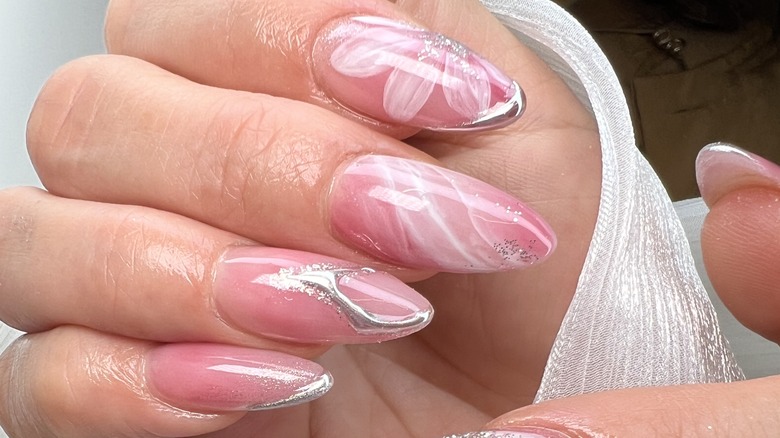 long almond-shaped pink and white nails