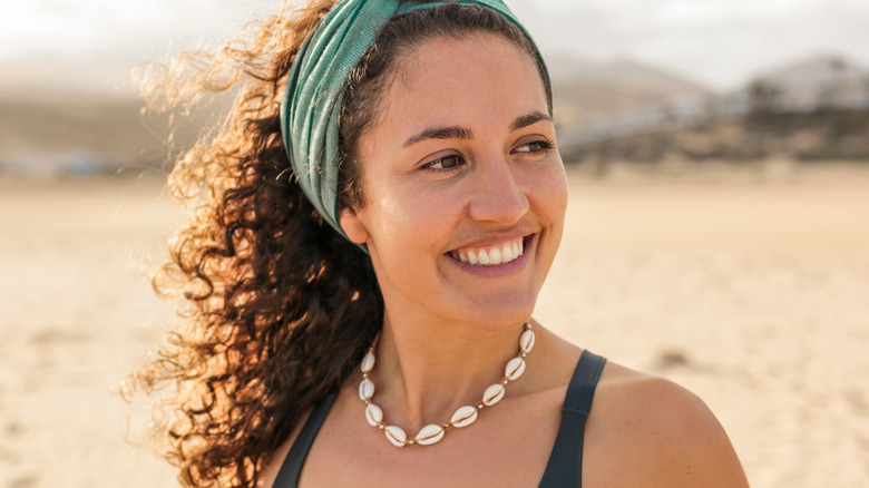 Girl wearing Puka shell necklace