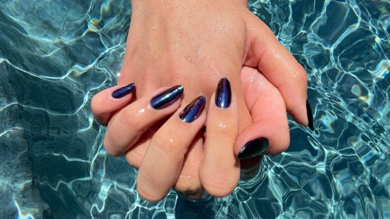 Oil-slick nails in pool