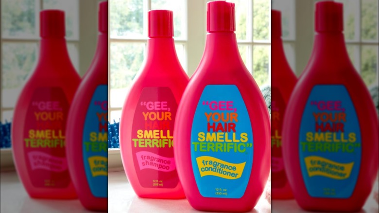 Bottles of "Gee, Your Hair Smells Terrific" shampoo and conditioner.