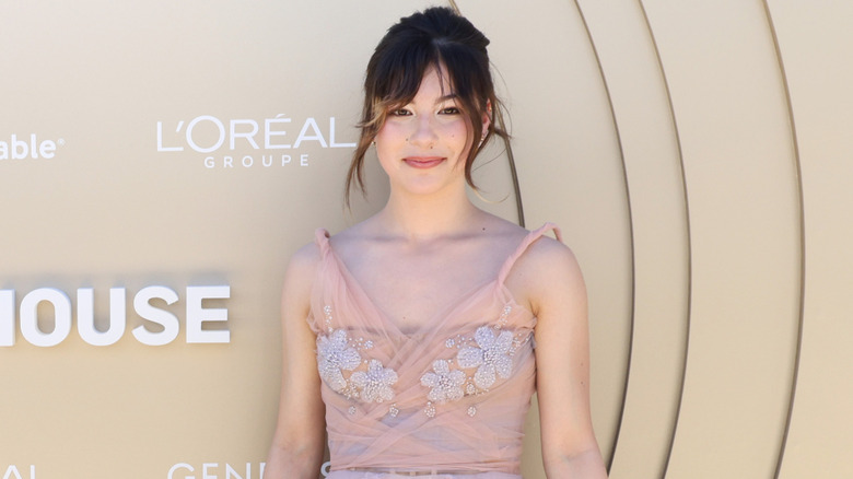 Alysa Liu wearing a pink dress