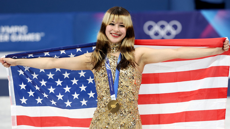 Alysa Liu holding the American flag