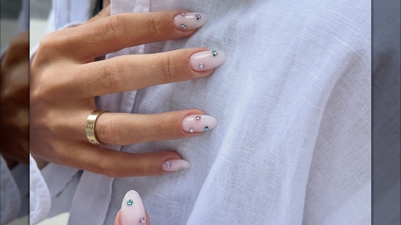 Woman with rhinestones on her nails